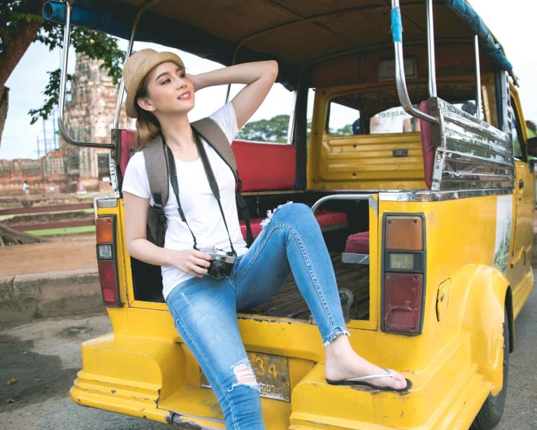 young-asian-female-traveler-with-backpack-traveling-ayutthaya-province-thailand (1)